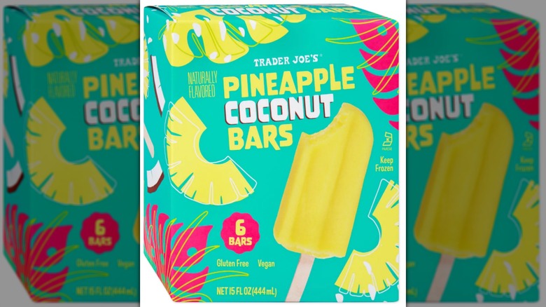 A box of pineapple coconut bars on a white background