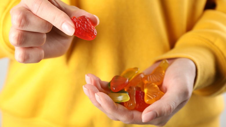 Person holding fruit snacks