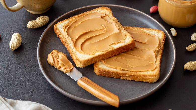 peanut butter on slices of bread