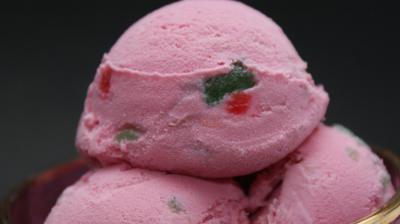 Close-up on scoops of pink tutti frutti ice cream in a bowl