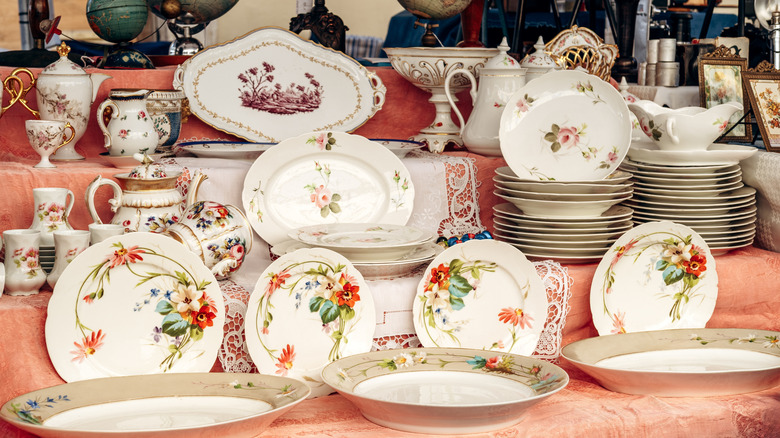 Vintage various china plates and cups on display