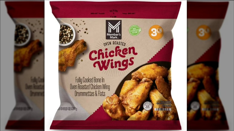 A bag of Member's Mark Oven-Roasted Chicken Wings on a white background with a mirror border
