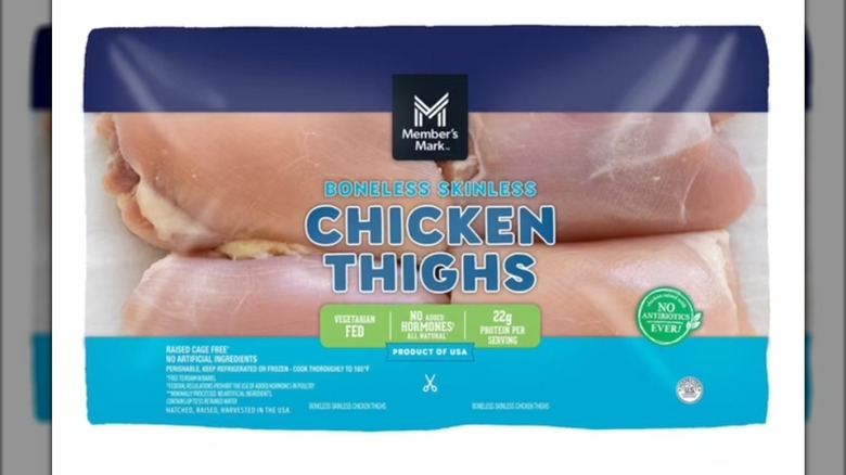 A package of Member's Mark boneless and skinless chicken thighs isolated on a white background