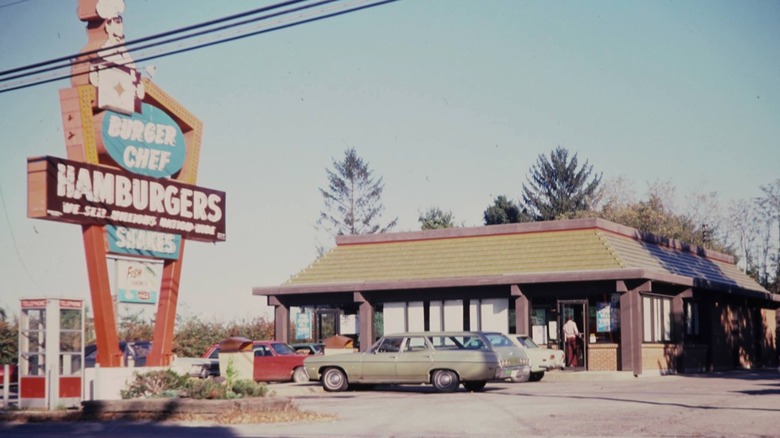 A vintage image of a Burger Chef, showing its road sign and the restaurant