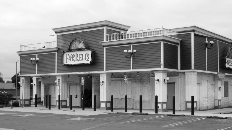 A black-and-white image of a Farrell's Ice Cream Parlor, seen from outside