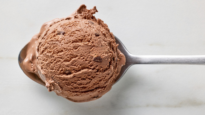 Chocolate ice cream bite in a spoon