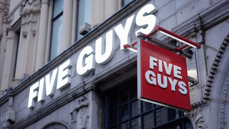 Five Guys signs 