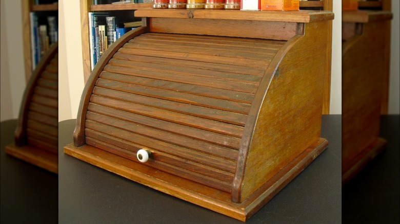 wooden bread box with white handle