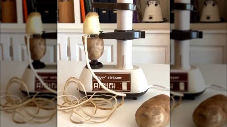 Dazey stripper device peeling a potato
