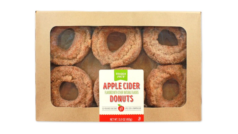 Package of apple cider donuts in a tan package against a white background.
