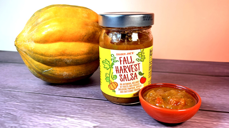 Bowl and jar of salsa