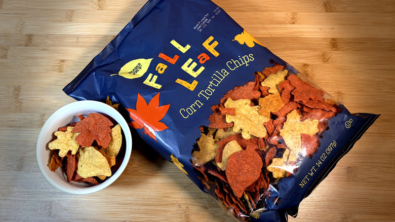 Top view of bag and bowl of leaf shaped chips