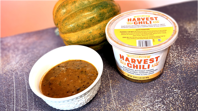 Bowl and container of chili