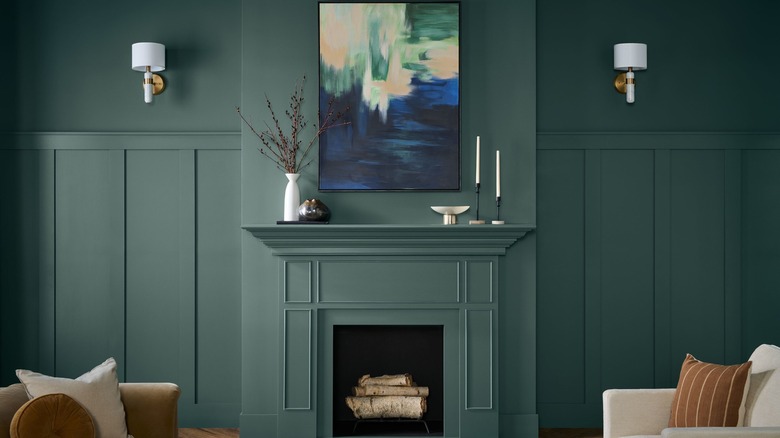 Living room walls and fireplace painted in Behr Hidden Gem