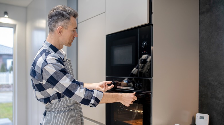 Man watching his broiler