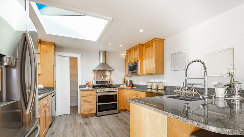 Neutral kitchen with large skylight