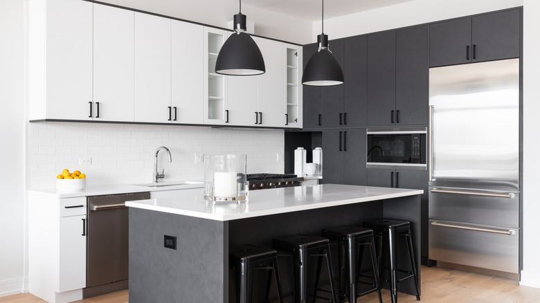 Bright kitchen with white and dark gray cabinets