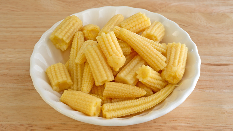 baby corn in white bowl