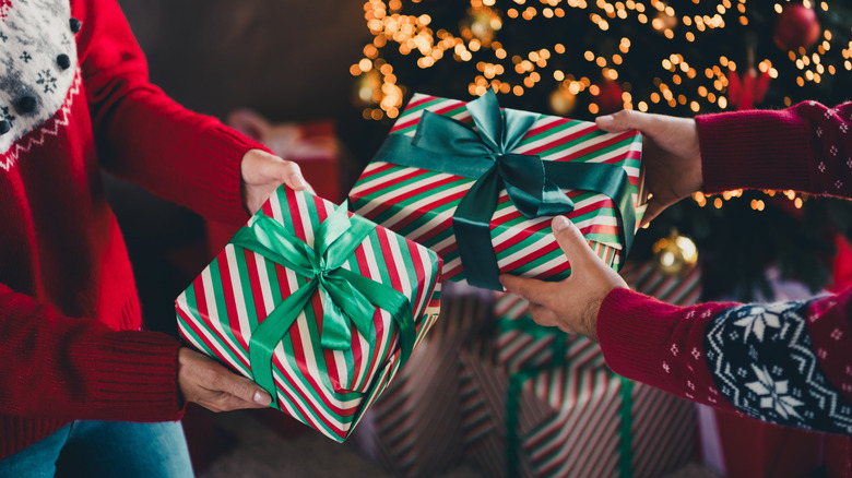 people exchanging presents