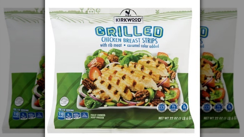 Grilled chicken strips on white background