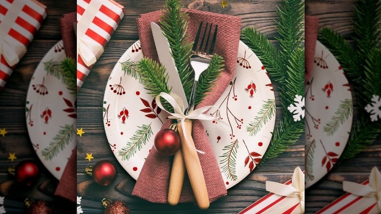 Holiday themed paper plate with cutlery