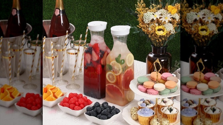 Two set of carafes with holiday food and decor