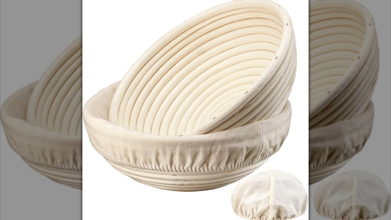 Two wicker baskets with linen covers