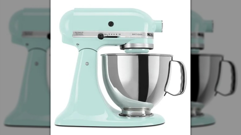 A light blue KitchenAid Artisan 5-Quart 10-Speed Stand Mixer on a white background