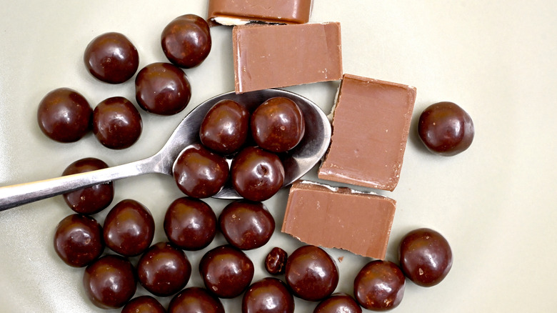 Malted milk balls with spoon