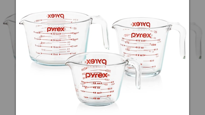 Pyrex Essentials glass measuring cups on a white background