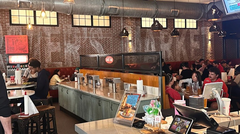 The interior of Polite Pig in Disney Springs