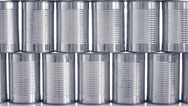 food cans stacked in row