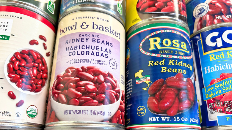Extreme close up of some cans of red kidney beans stacked together
