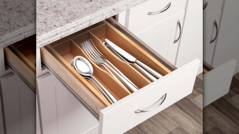 Cutlery in small bamboo organizer in drawer