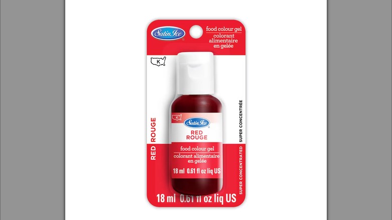 Satin ice red food color gel in packaging on white background.