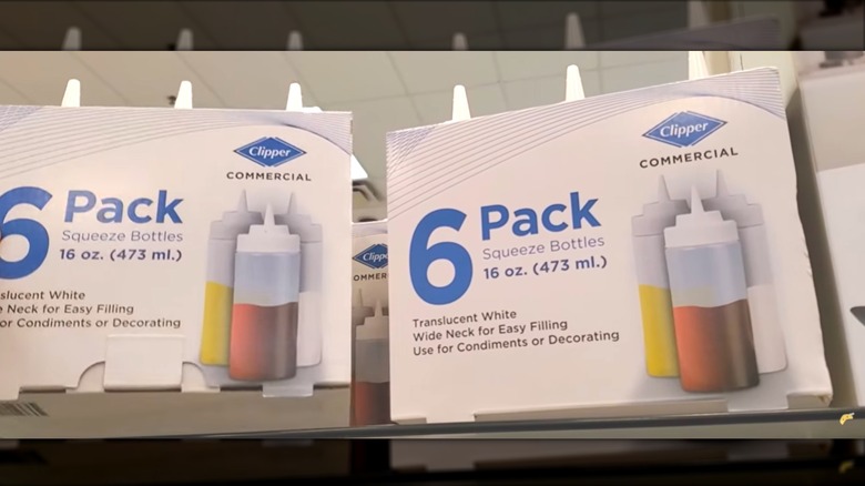 2 boxes of 6 squeeze bottles in packaging on a shelf