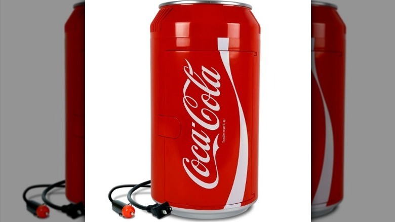 Coca Cola mini fridge on white background