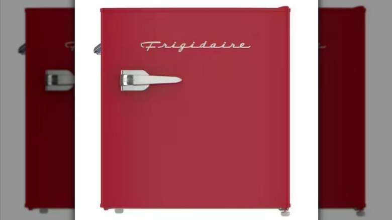 Square retro mini fridge on white background