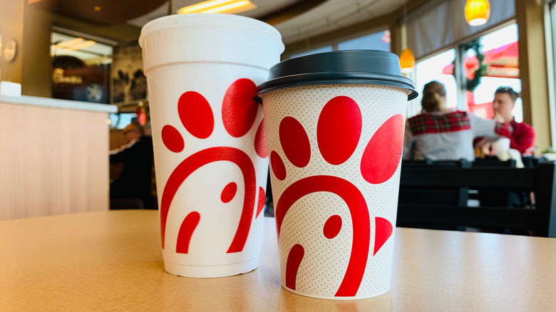 A pair of drinks from Chick-fil-A on a table at the restaurant