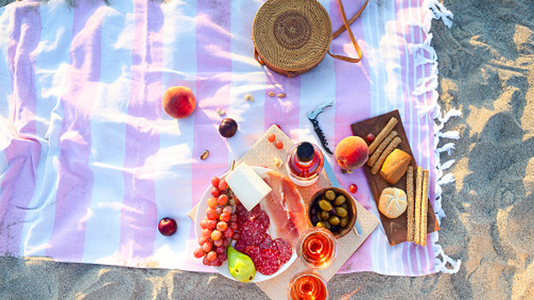 Overview of snacks on beach blanket
