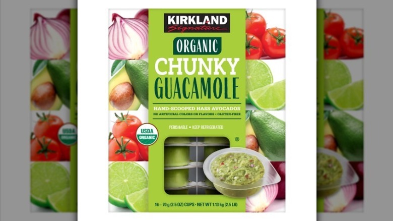 Chunky guacamole cups on white background
