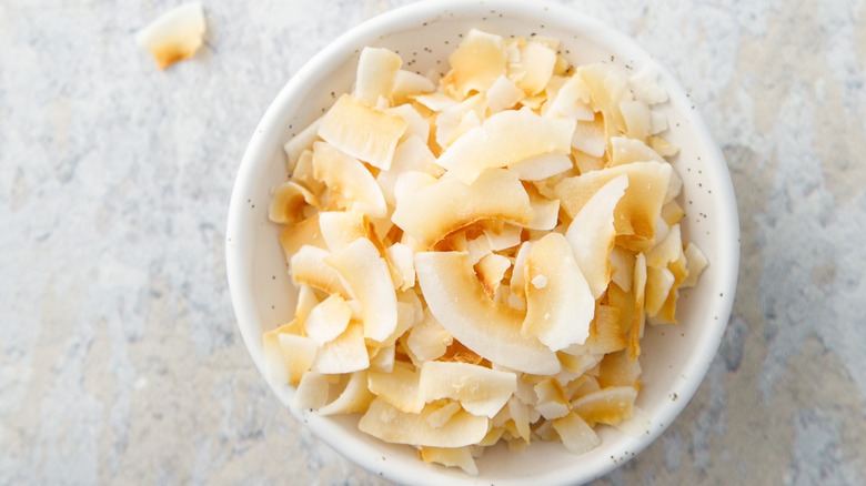 Toasted coconut chips white bowl