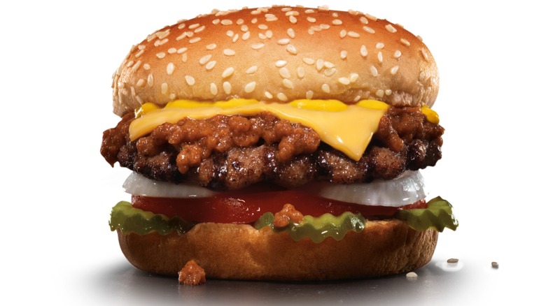 A Carl's Jr. Chili Cheeseburger against a white background