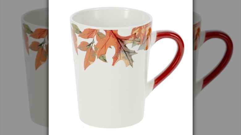 Autumn leaf mug on white background