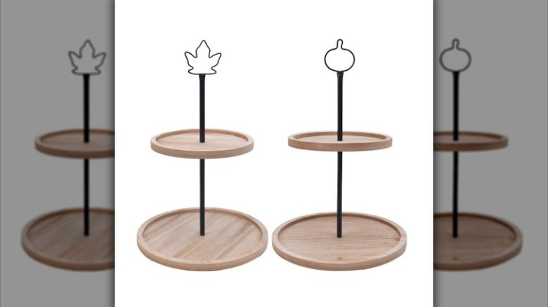 2-tier decorative tray options, one with a leaf design on top, and one with a pumpkin design on top on white background