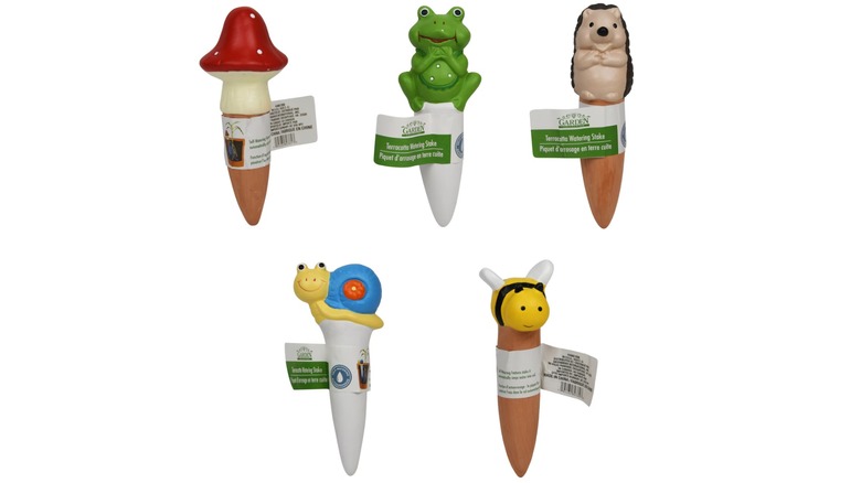 Terracotta stakes with a mushroom, frog, hedgehog, snail, and bee