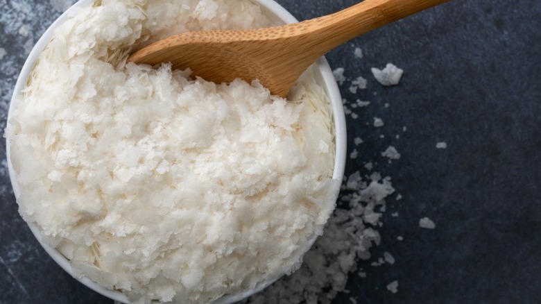 Mashed potato flakes in bowl with spoon