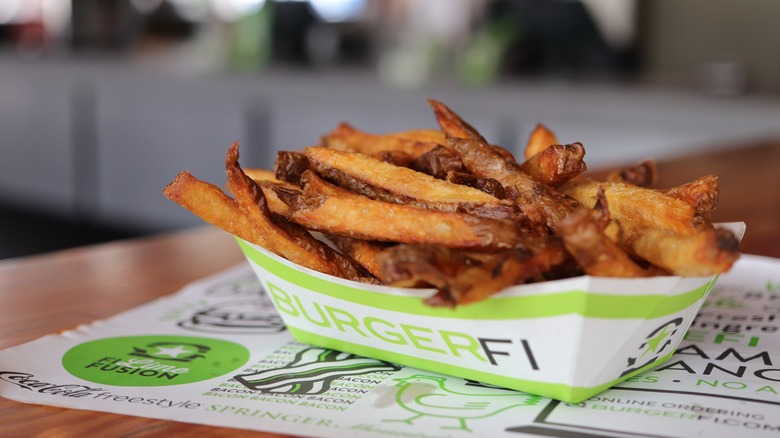 BurgerFi fries in tray on table
