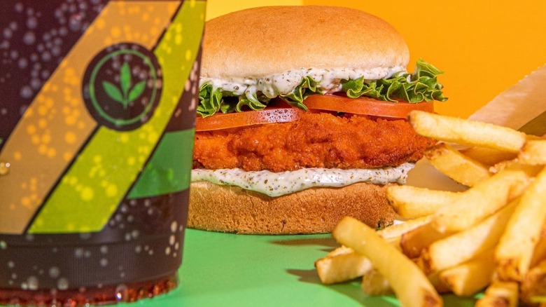 Plant Power Fast Food meal with drink, chicken sandwich, and fries