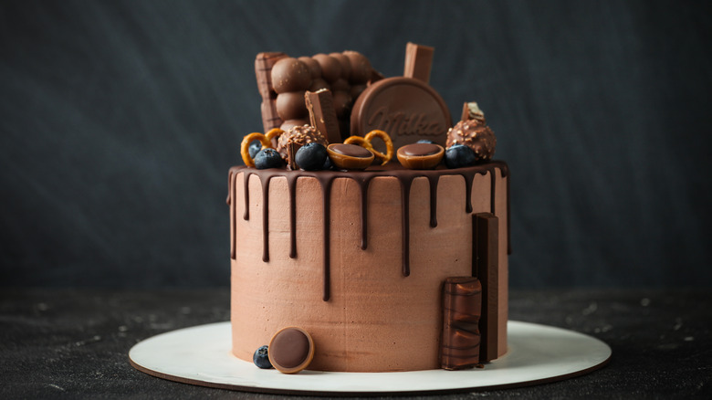 Ornate chocolate cake with toppings